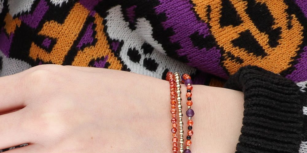 Bransoletka damska gold filled z cyrkoniami, ametystem i onyksem na ręce HALLOWEEN Pomarańczowo-fioletowa bransoletka damska gold filled z cyrkonii, ametystu i onyksu HALLOWEEN